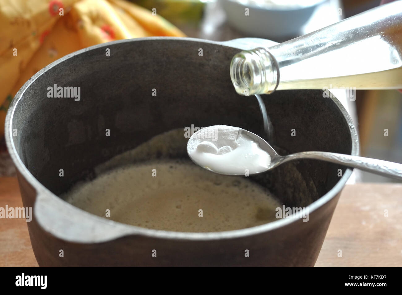Process Of Quenching The Baking Soda With The Vinegar In A Spoon Over A Cast iron Bowl With The Batter Close up Picture Process Of Cooking Stock Photo Alamy